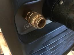 Quick release type argon fitting on the back of GTAW machine