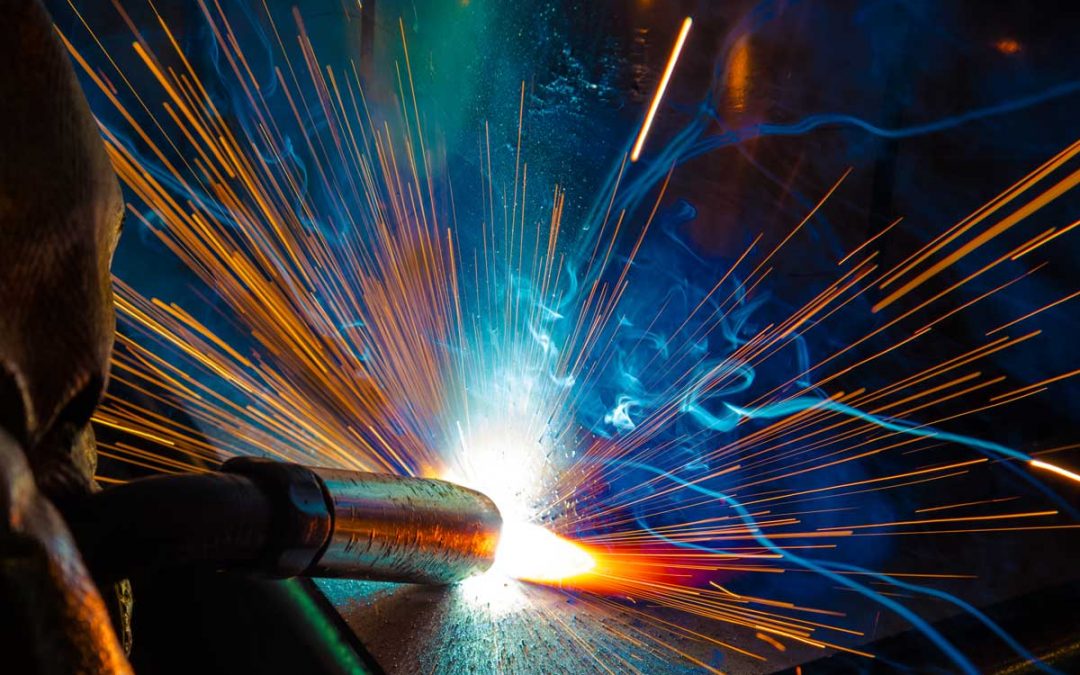 welder, craftsman, erecting technical steel Industrial steel welder in factory technical